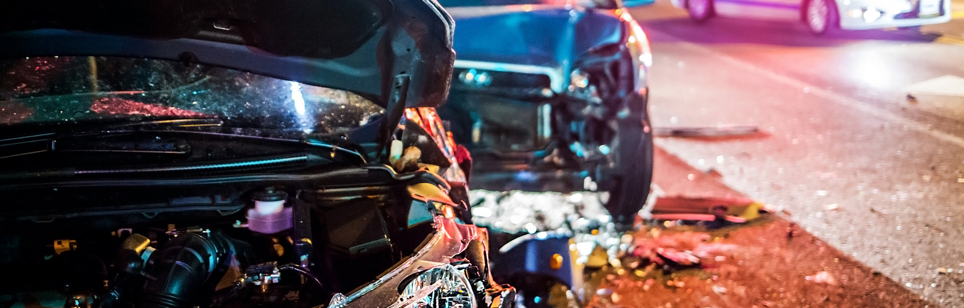 Many broken cars after a traffic accident in the parking lot of a